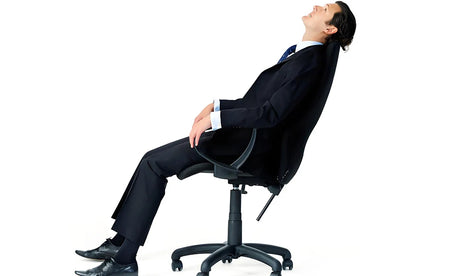 Why Should Office Workers Avoid Leaning Too Far Back in Their Chairs?